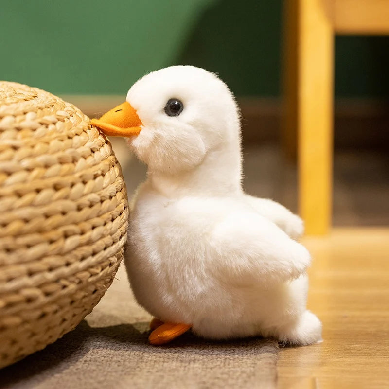 Realistic duck stuffed animal size comparison with adult hand