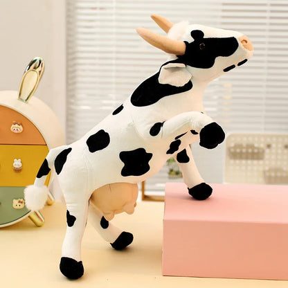 Realistic standing cow stuffed animal with black and white pattern detail