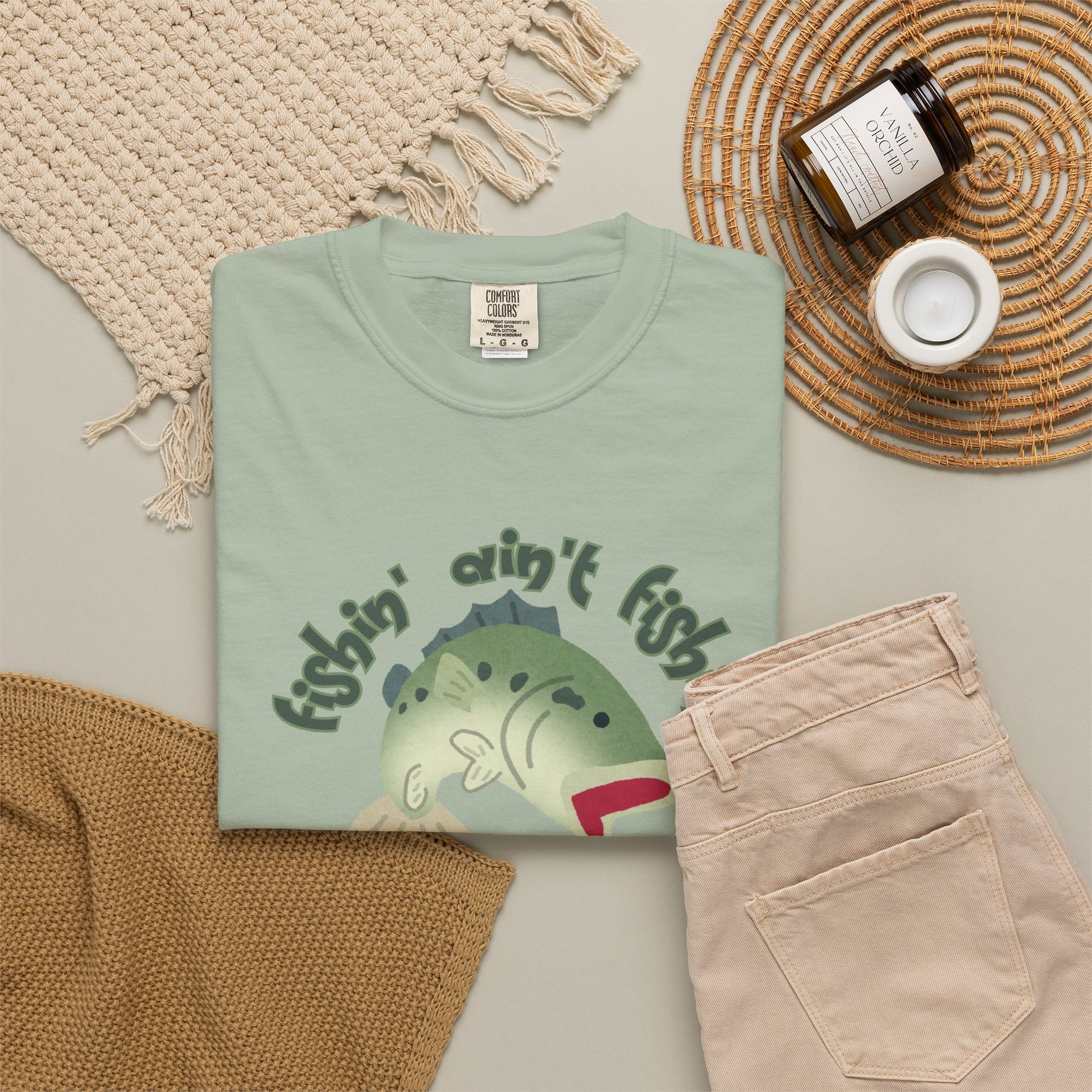 Relaxed fit angler tee with largemouth bass mid jump graphic detail