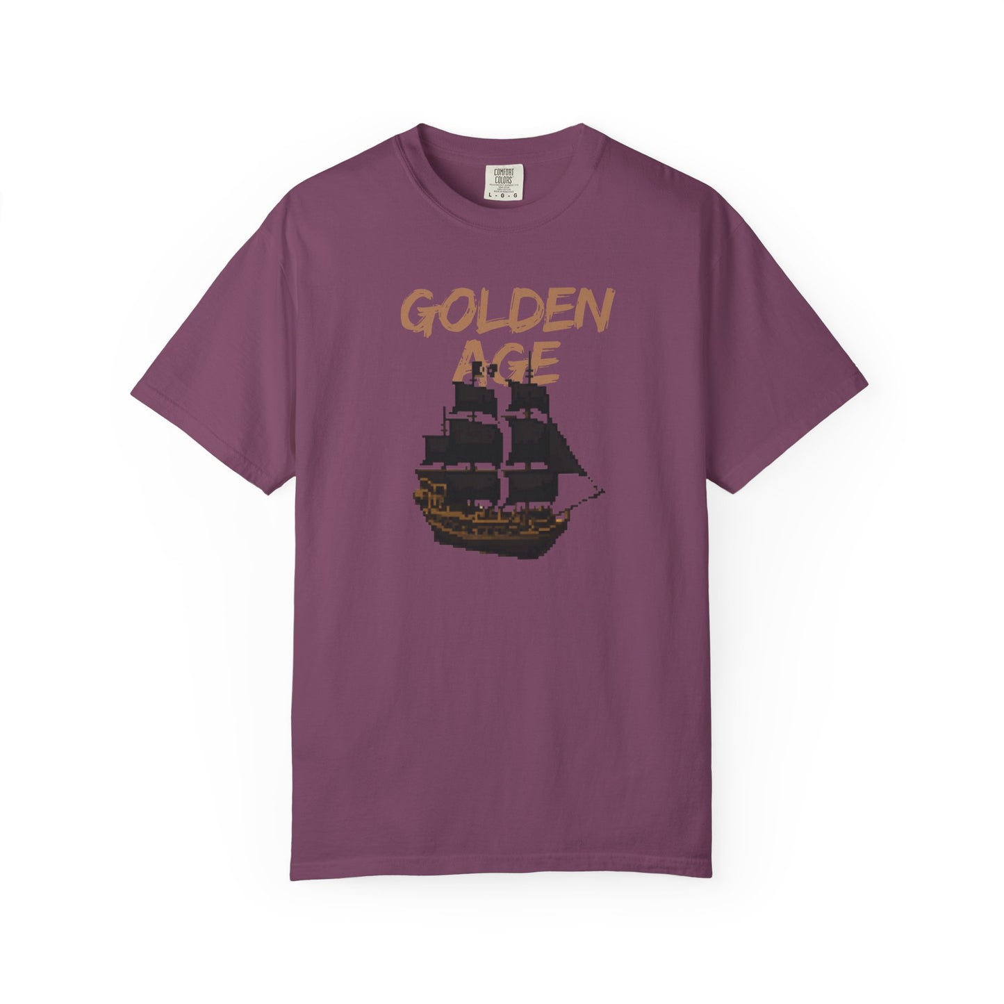 Retro gaming apparel ocean adventure tee on a model in an outdoor coastal setting

