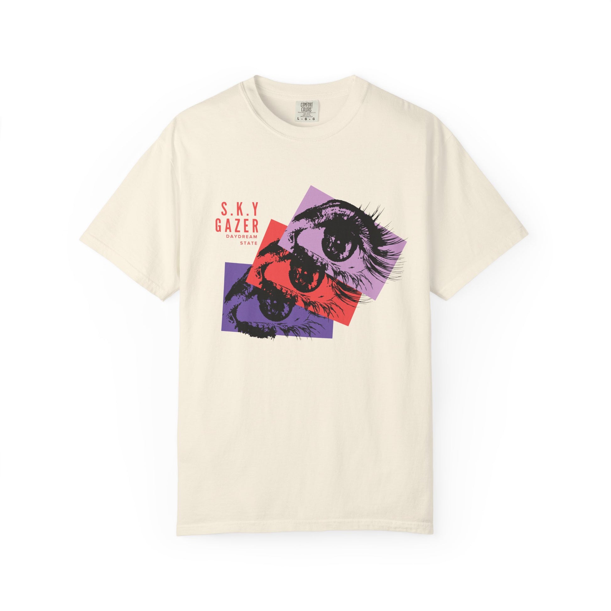 Retro pop art eye tee close up showing washed purple and red layered eye graphic with SKY GAZER label