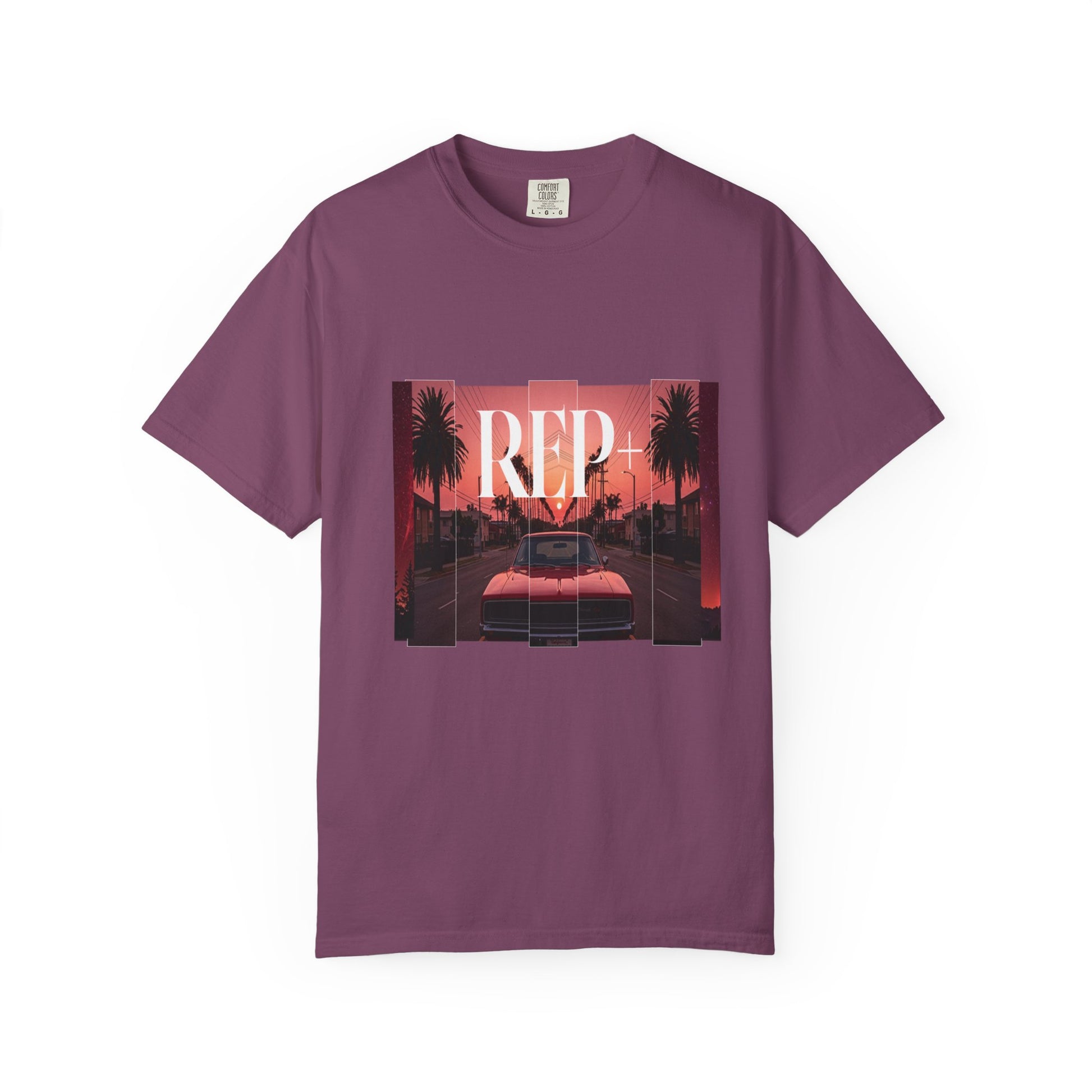 Retro sunset graphic tee showing a low-slung red car on a California boulevard