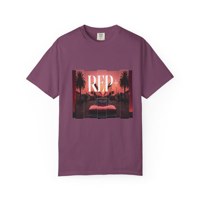 Retro sunset graphic tee showing a low-slung red car on a California boulevard