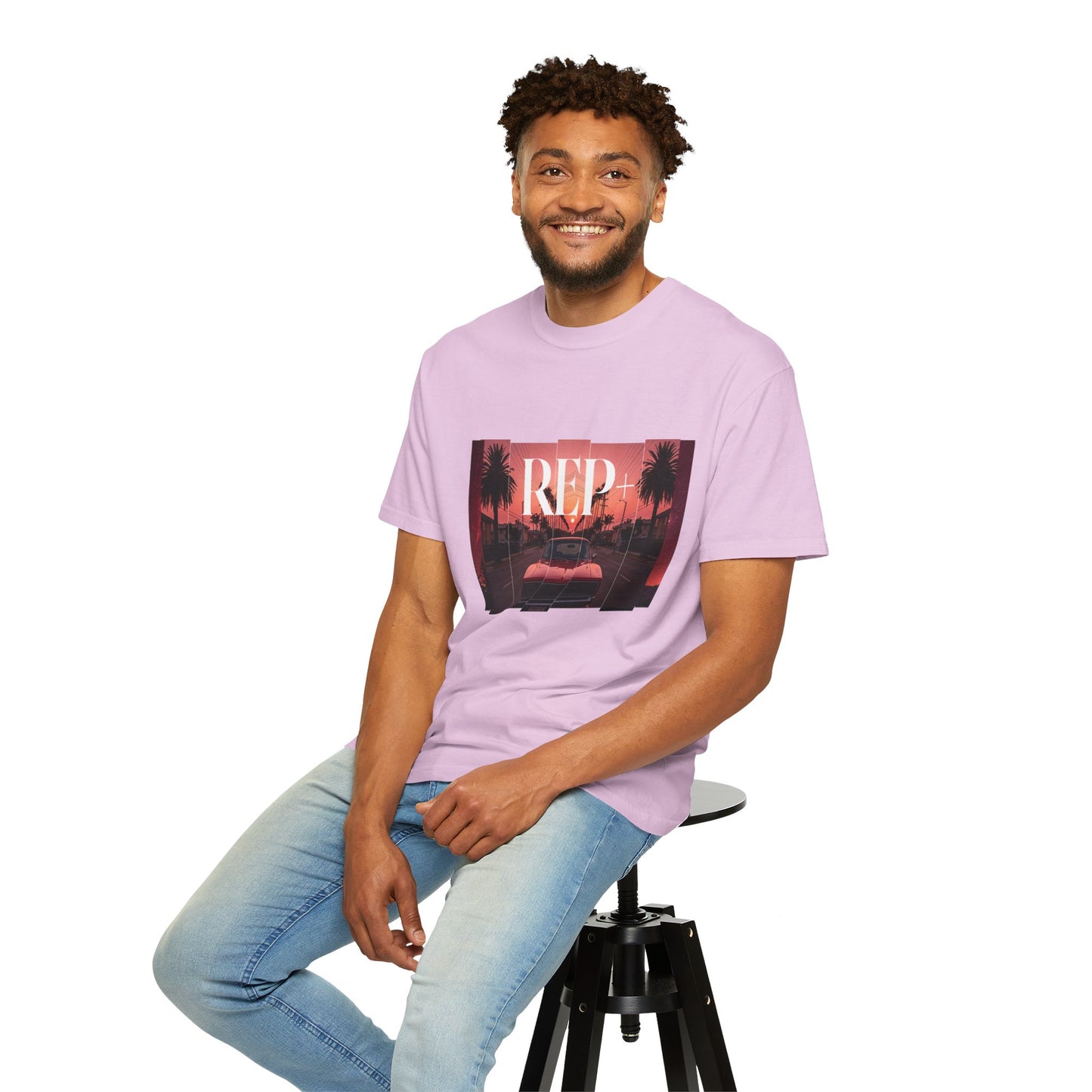 Retro sunset streetwear tee with chrome muscle car and fading orange-to-pink sky