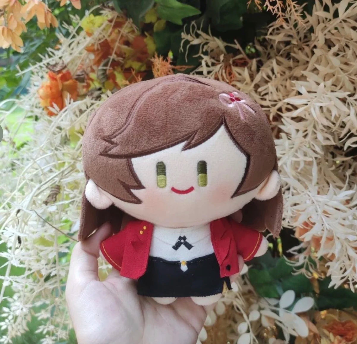 Rosa fan made plush with clothes, full outfit detail close up on white surface