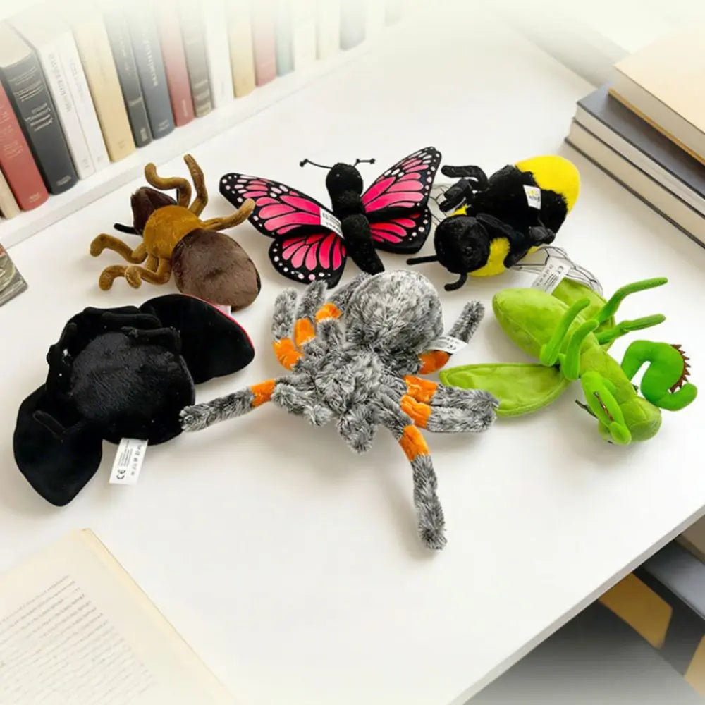 Round soft spider plush toy with eight articulated fabric legs spread wide