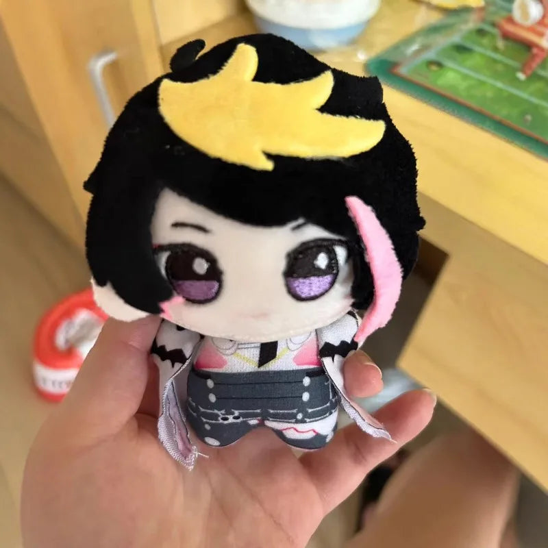 Shu Yamino plush keychain held in hand showing full 10cm size, fanmade cute plush keychain for VTuber fans and collectors