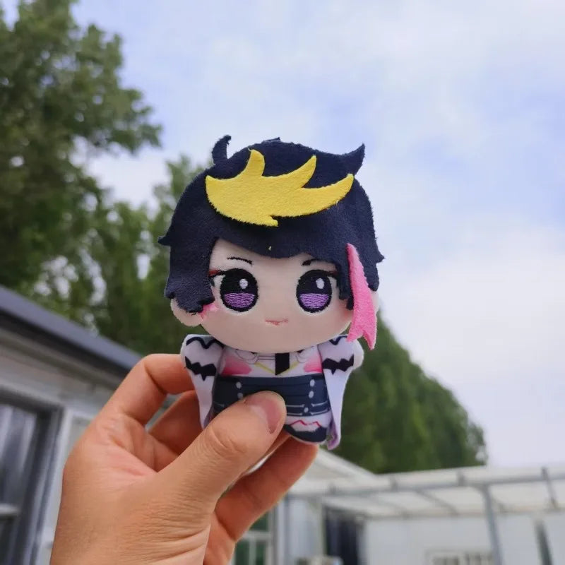 Shu Yamino chibi plush keychain hanging from a lanyard, con companion plush for anime conventions and VTuber fan meetups