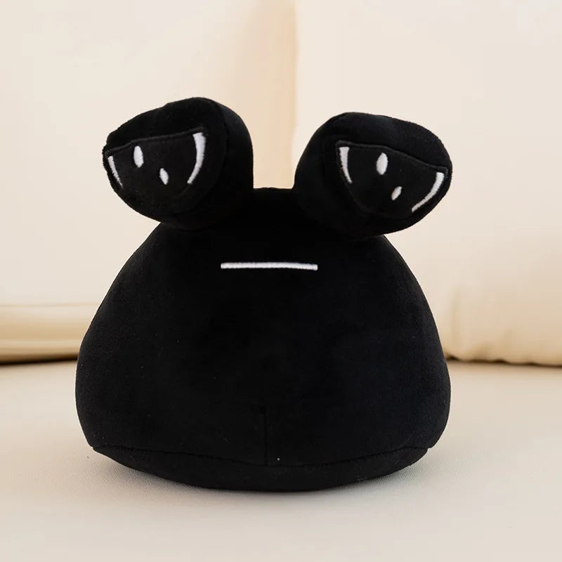Sad Pou plush rear and side view showing PP cotton filled body and soft plush material
