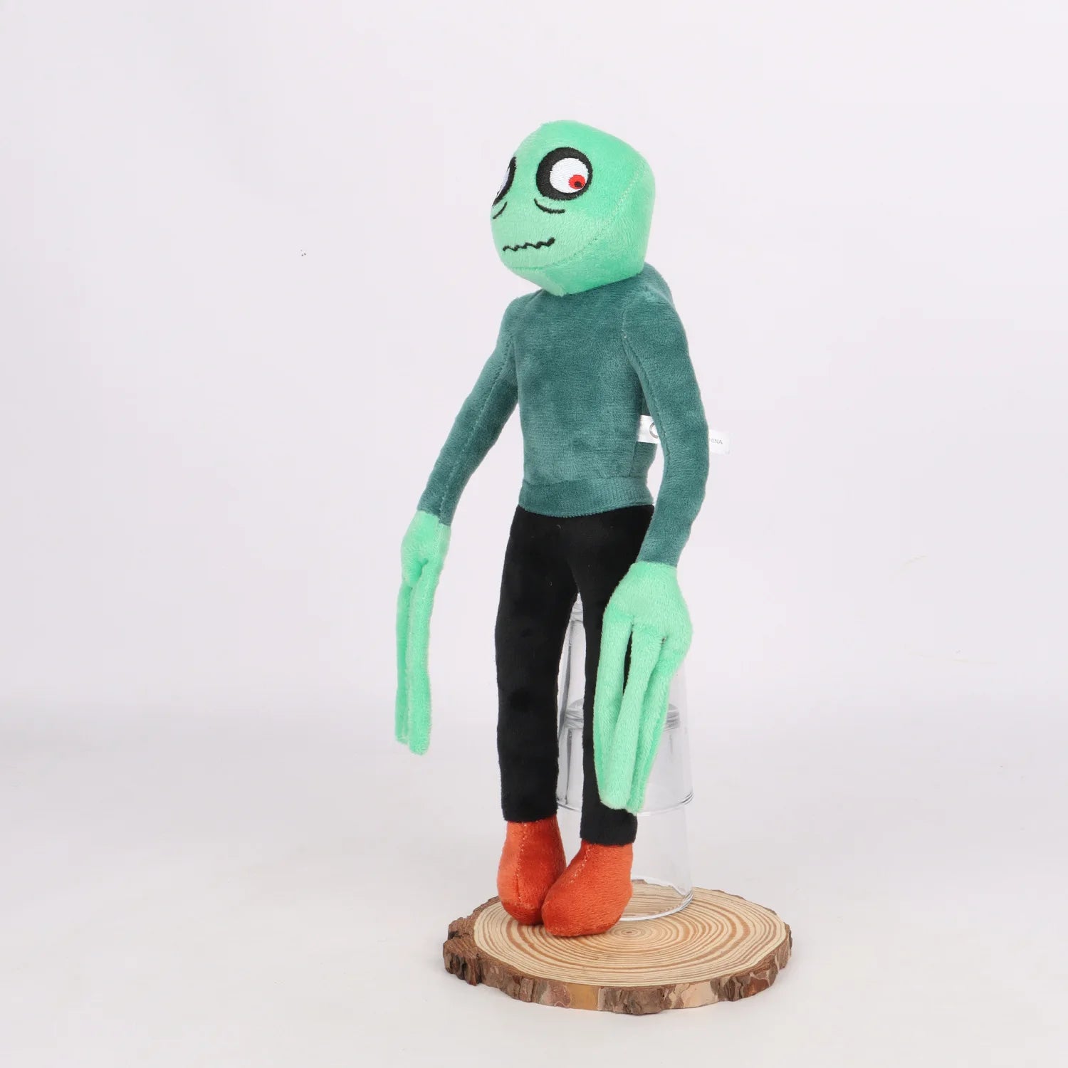Salad Finger plush pale green character close-up detail
