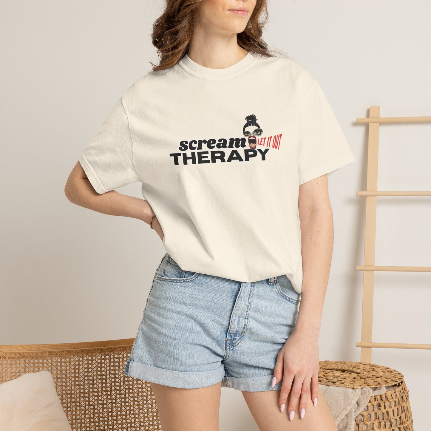 Scream therapy tee detail shot – cutout eyes and wide-open screaming mouth graphic