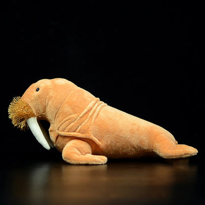 Sea animal plush walrus displayed alongside other ocean animal collectibles