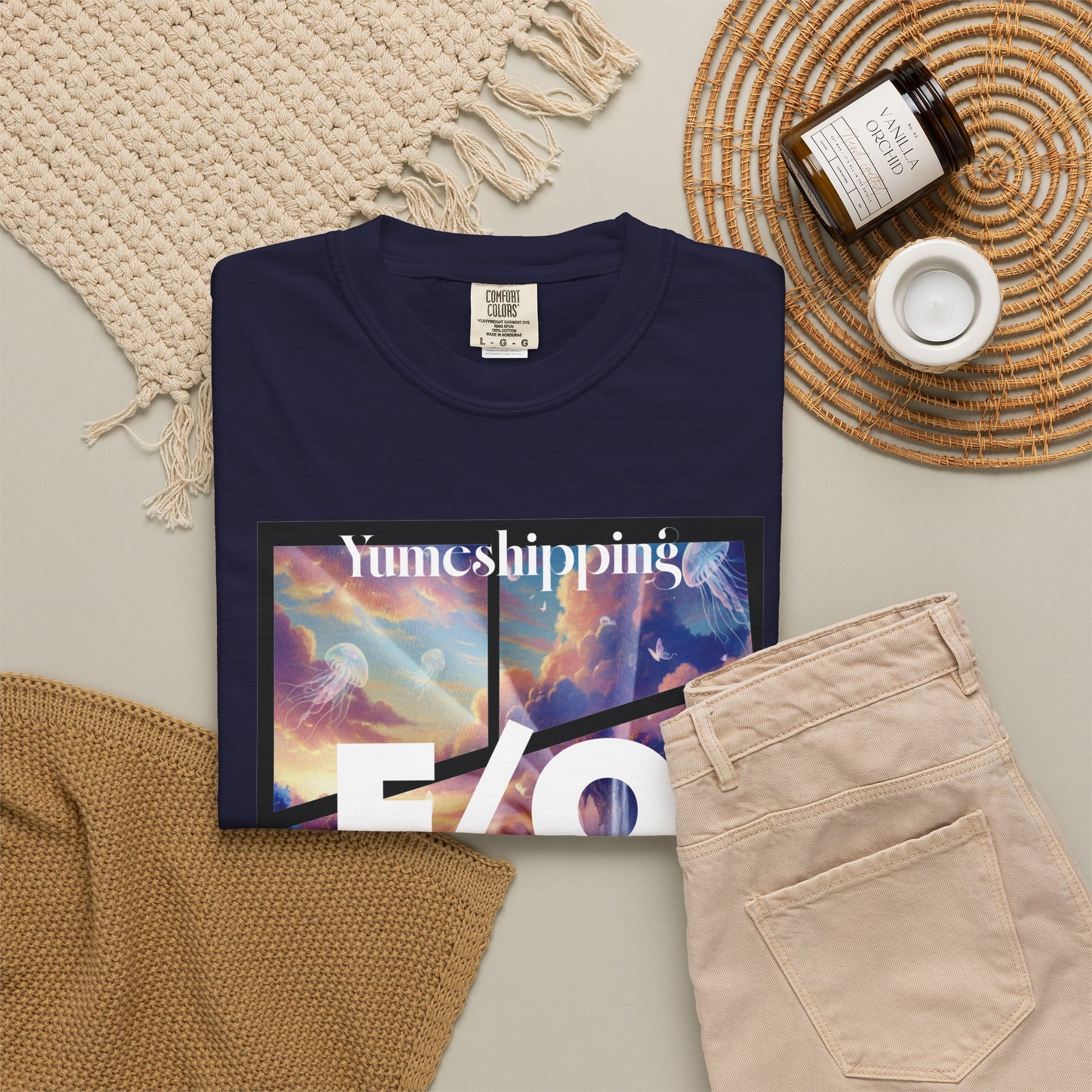 Self-ship community shirt with bold Yumeshipping header and DREAMING OUT LOUD cursive on fantasy background