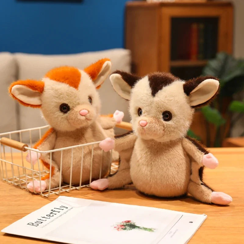 Kawaii sugar glider stuffed animal placed on a wooden shelf
