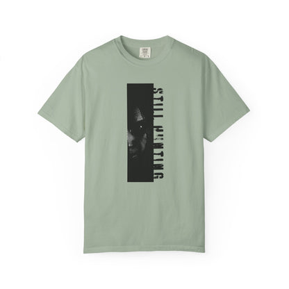 Shadow investigator graphic tee flat lay dark surface moody styled product shot
