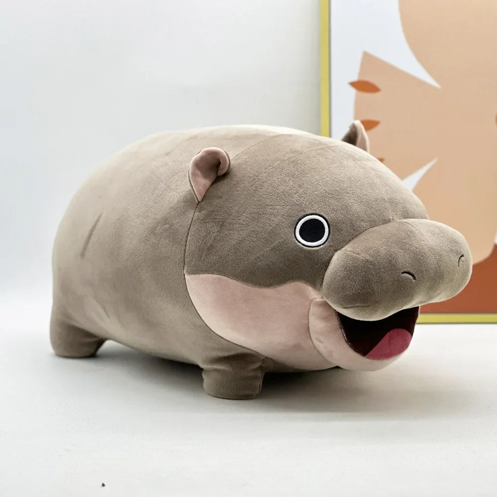Side profile of Moo Deng stuffed animal showing PP cotton-filled body and realistic hippo silhouette
