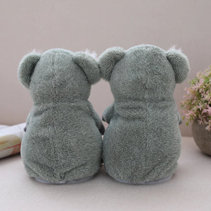 Side profile of electronic plush toy koala showing its round body shape