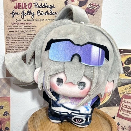 Silver wolf plush 10cm size shown next to a hand for scale
