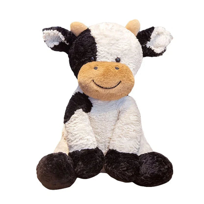 Sitting cow plush toy front view showing black and white spotted pattern on white background