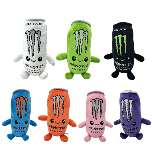 Six Monster Energy can-shaped plush toys in different colors are arranged in two rows on a white background. The top row shows white, green, and black versions, and the bottom row shows blue, orange, pink, and purple versions.