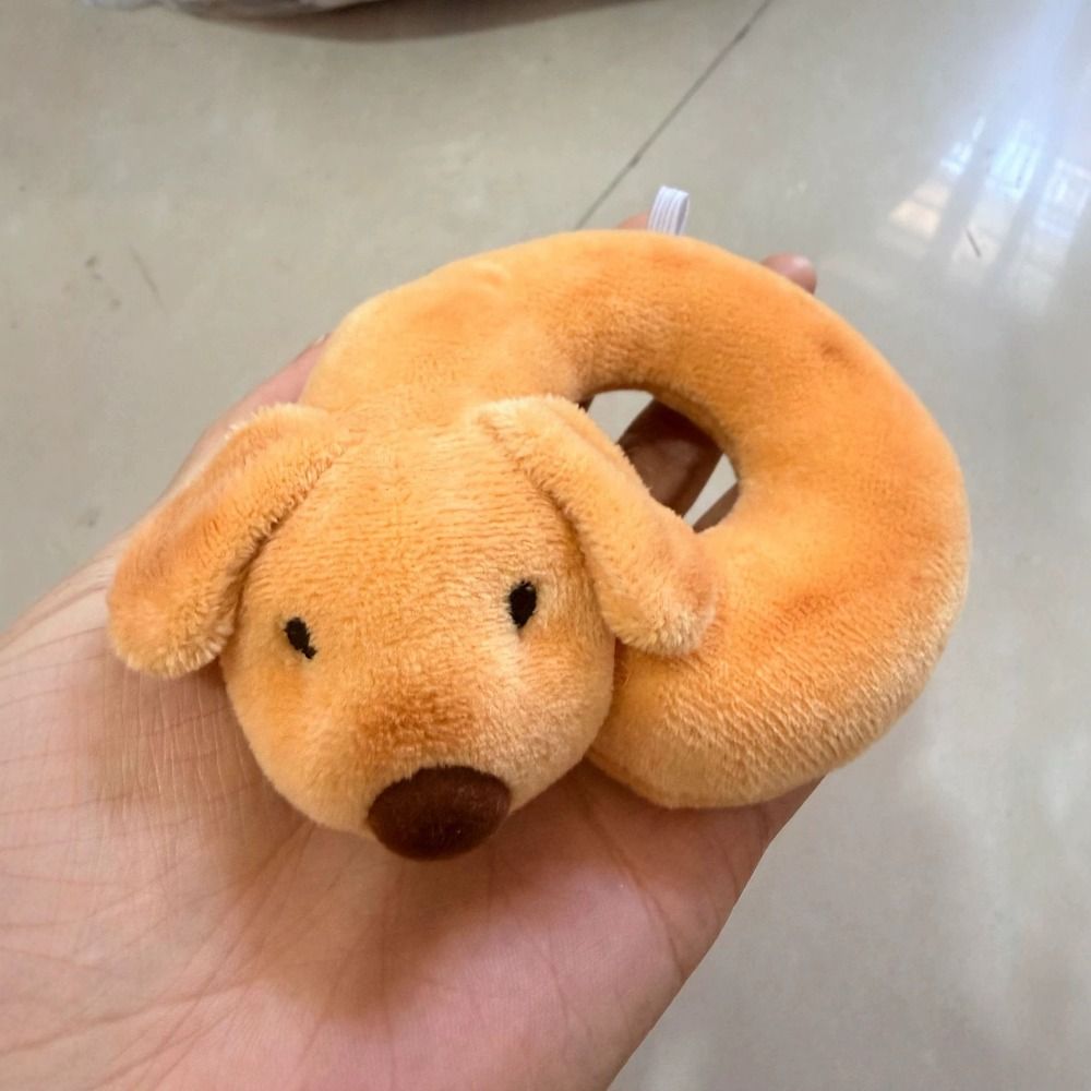Sleeping dog plush keychain soft plush texture detail shot