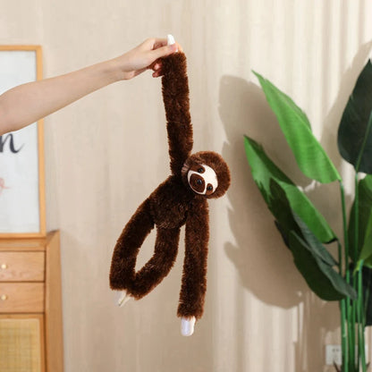 Sloth plushie hanging from curtain rod, soft PP cotton filled stuffed animal