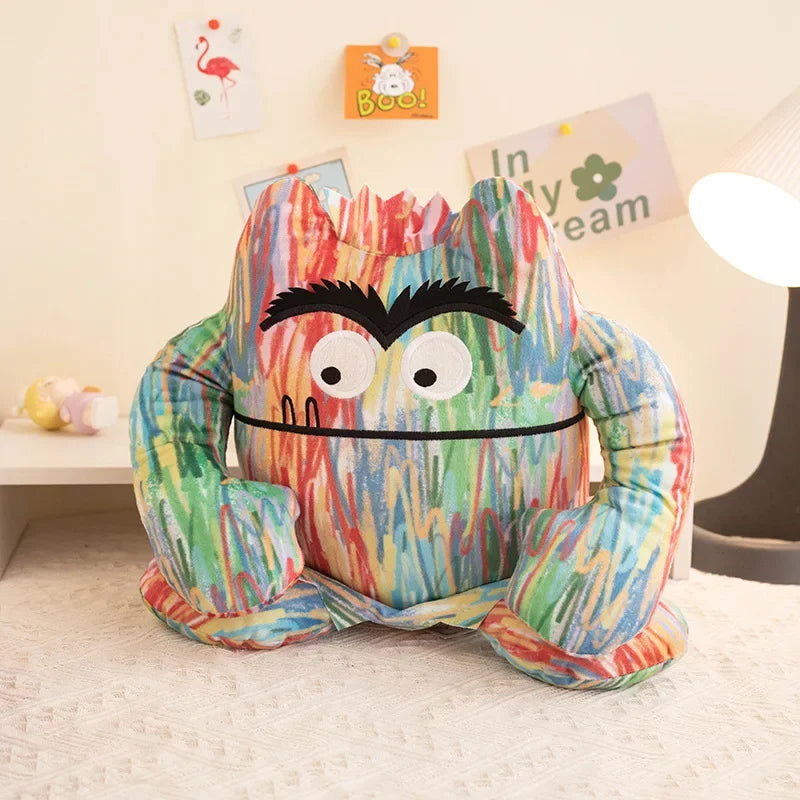 Small 15cm color feelings monster plush sitting on a desk as a daily companion