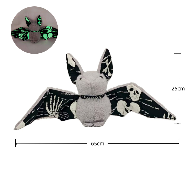 Small 18cm Halloween bat plush on wooden surface