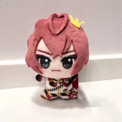 Small soft anime plush figure with red eyes and dark uniform
