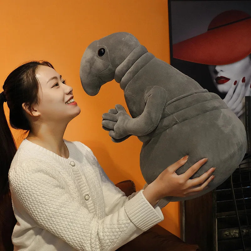 Snorp meme plush toy showing folded arms and droopy expression
