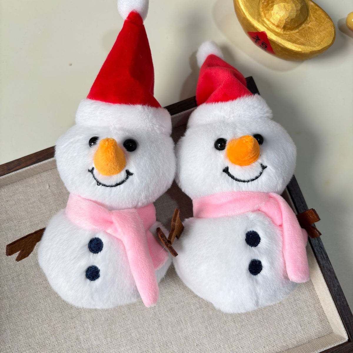 Snow man stuffed toy with Santa hat side profile 12cm scale reference