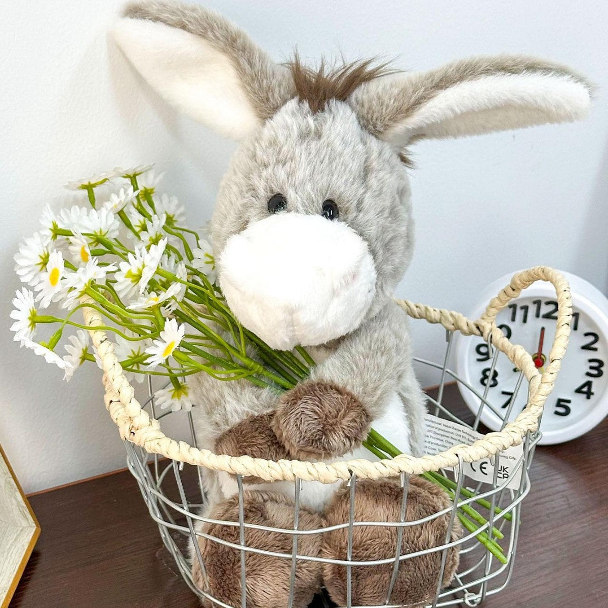 Soft donkey toy with PP cotton tag visible at the seam
