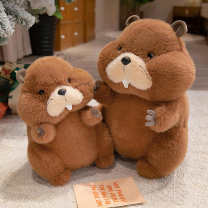 Soft groundhog toy in large size propped against a neutral background