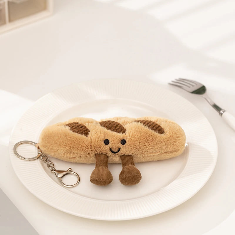 Soft handmade bread plushie held in hand for size reference, cute stuffed animal collectible