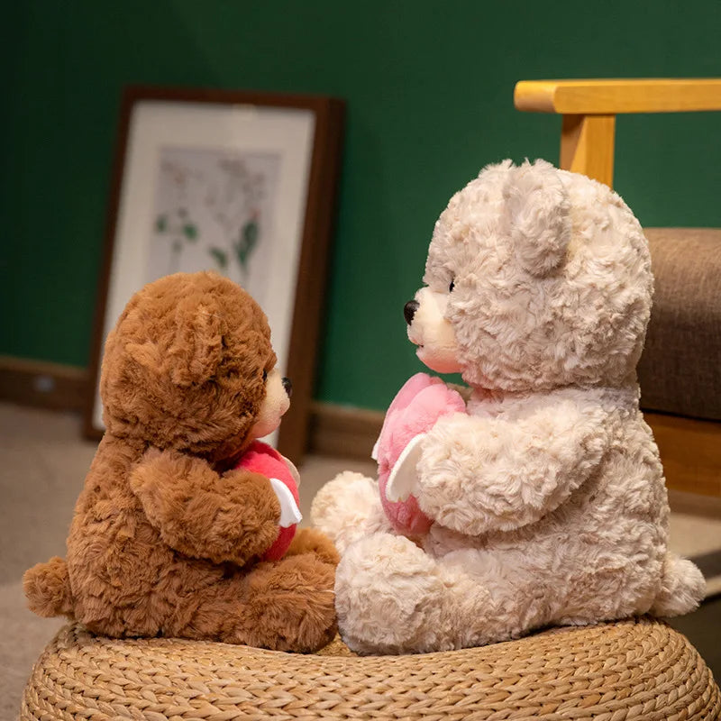 Soft plush stuffed bear brown angel wings texture detail close up