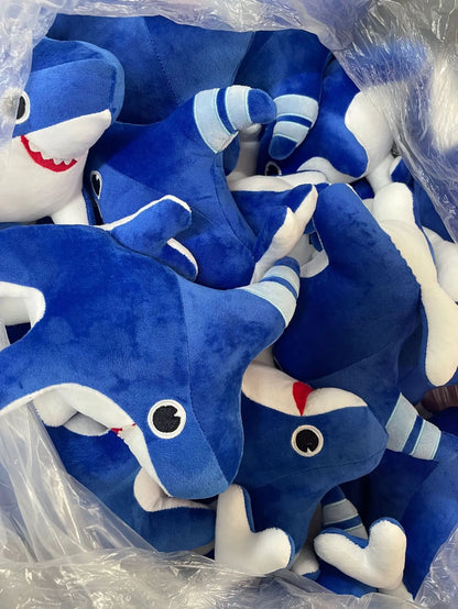 Soft shark dog stuffed animal close-up face detail