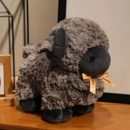 Soft sheep stuffed animal 23cm shown in flat lay with pastel background