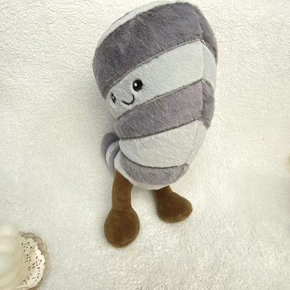 Soft weather plush toy sitting on shelf as aesthetic room decor

