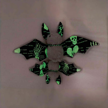 Spooky novelty gift bat plush in Halloween display setting