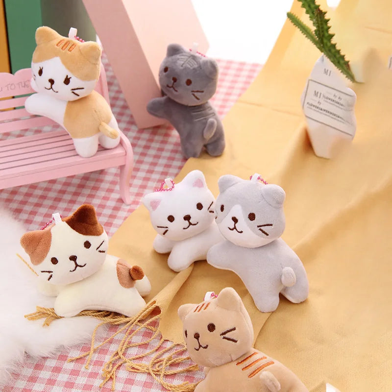 Striped Ginger tilt-head kitten backpack charm keychain product photo