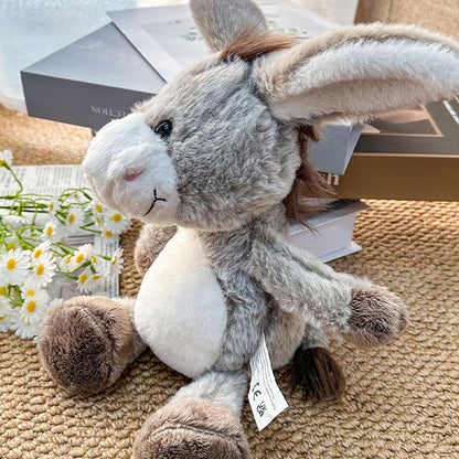 Stuffed donkey in a farmhouse style nursery setting