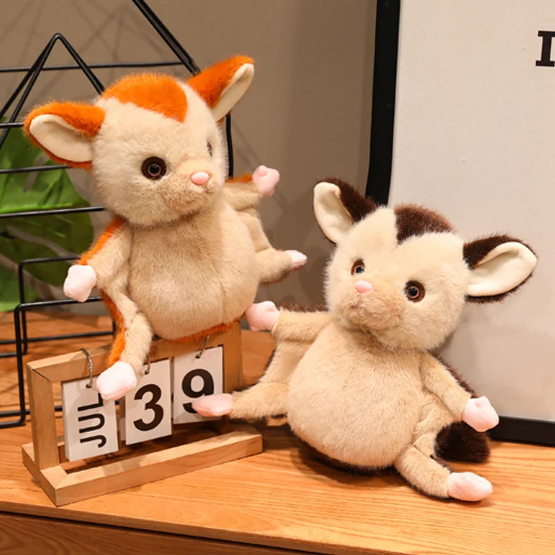 Sugar glider plush next to real sugar glider photo for size and accuracy comparison
