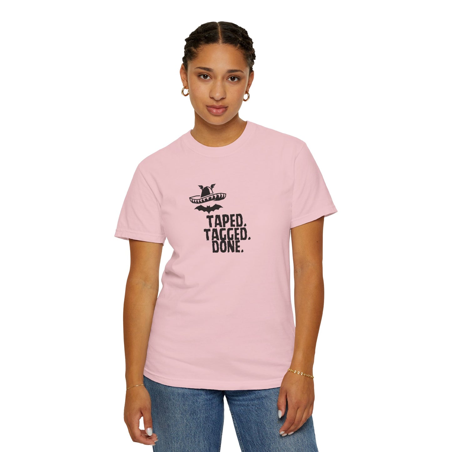 Sunlit outdoor portrait wearing The Midnight Mariachi bat sombrero streetwear shirt
