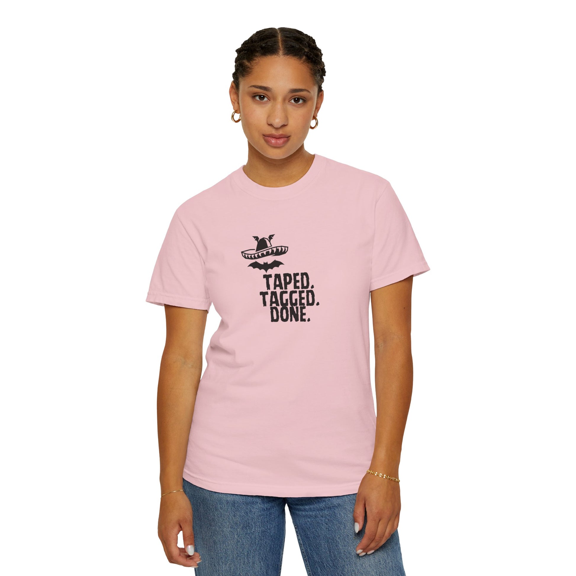 Sunlit outdoor portrait wearing The Midnight Mariachi bat sombrero streetwear shirt
