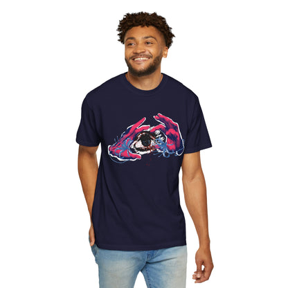 Surreal eye and hands graphic tee folded flat showing garment dyed color depth and heavyweight fabric texture