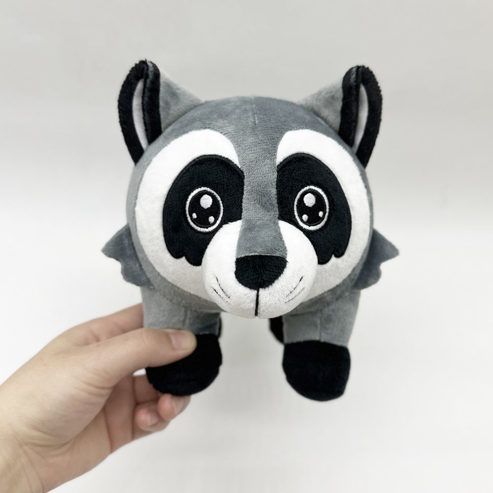 The Jimothy stuffed animal placed inside clean gift packaging.