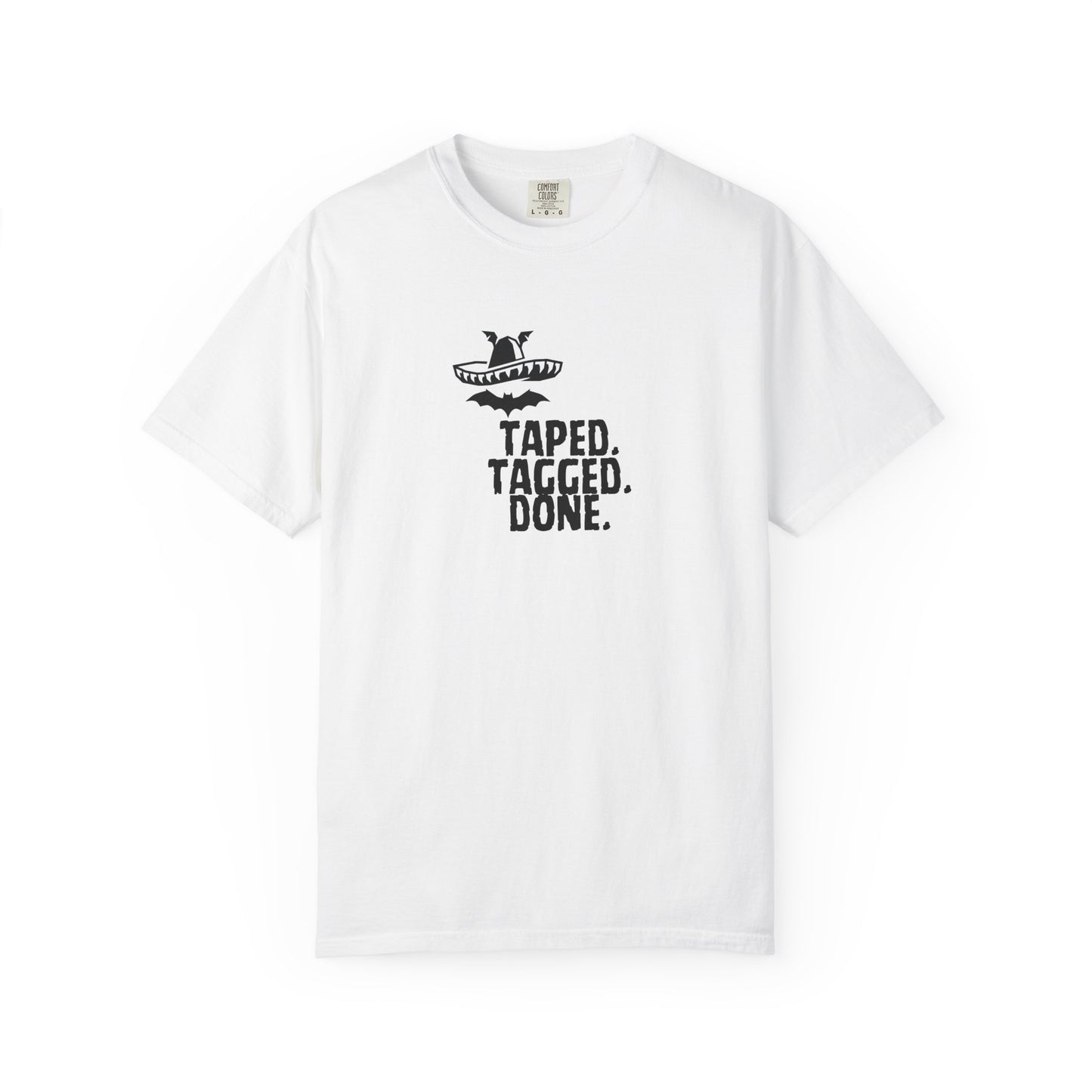 The Midnight Mariachi Taped Tagged Done graphic tee featuring bat winged sombrero design on garment dyed heavyweight cotton shirt
