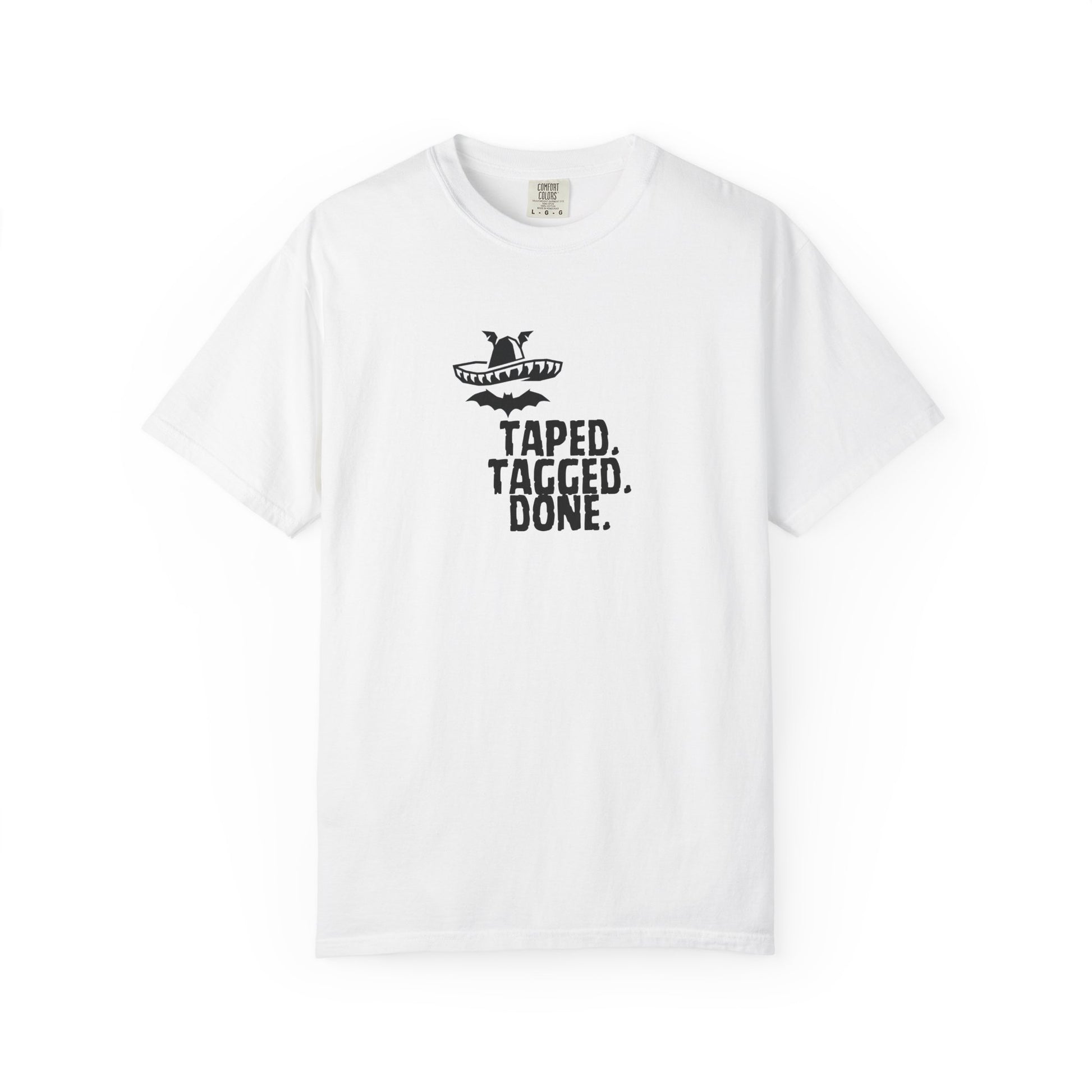 The Midnight Mariachi Taped Tagged Done graphic tee featuring bat winged sombrero design on garment dyed heavyweight cotton shirt