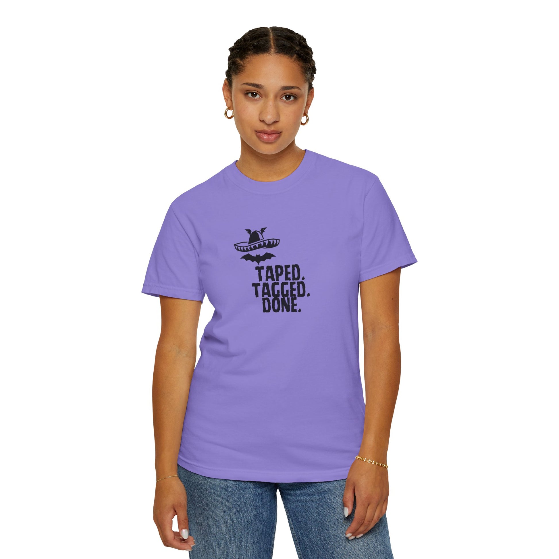 The Midnight Mariachi bat winged sombrero artwork showcased on pepper colorway garment dyed tee
