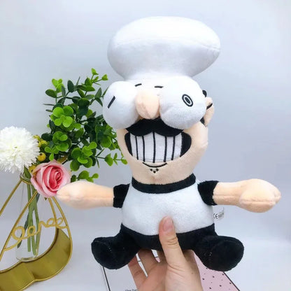 The Noise fan plush toy close up, handmade soft stuffed animal inspired by the iconic yellow parka wearing rival character